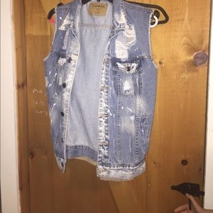 Distressed denim vest