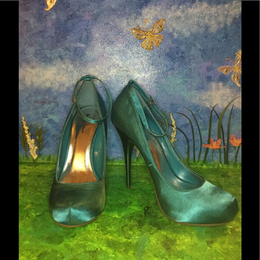 Michael Antonio turquoise Luna , size 8 1/2. NIB
