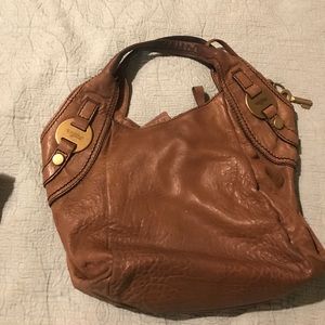 Large fifty-four fossil brown purse