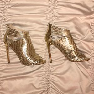 Strappy gold high heels!