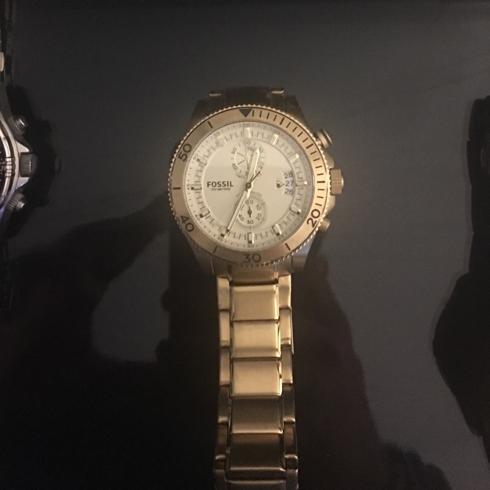 Gold fossil watch