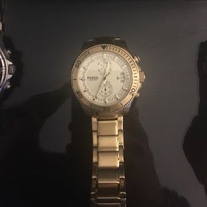 Gold fossil watch