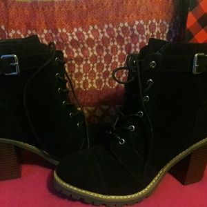 BLack chunky heel booties with velvet texture