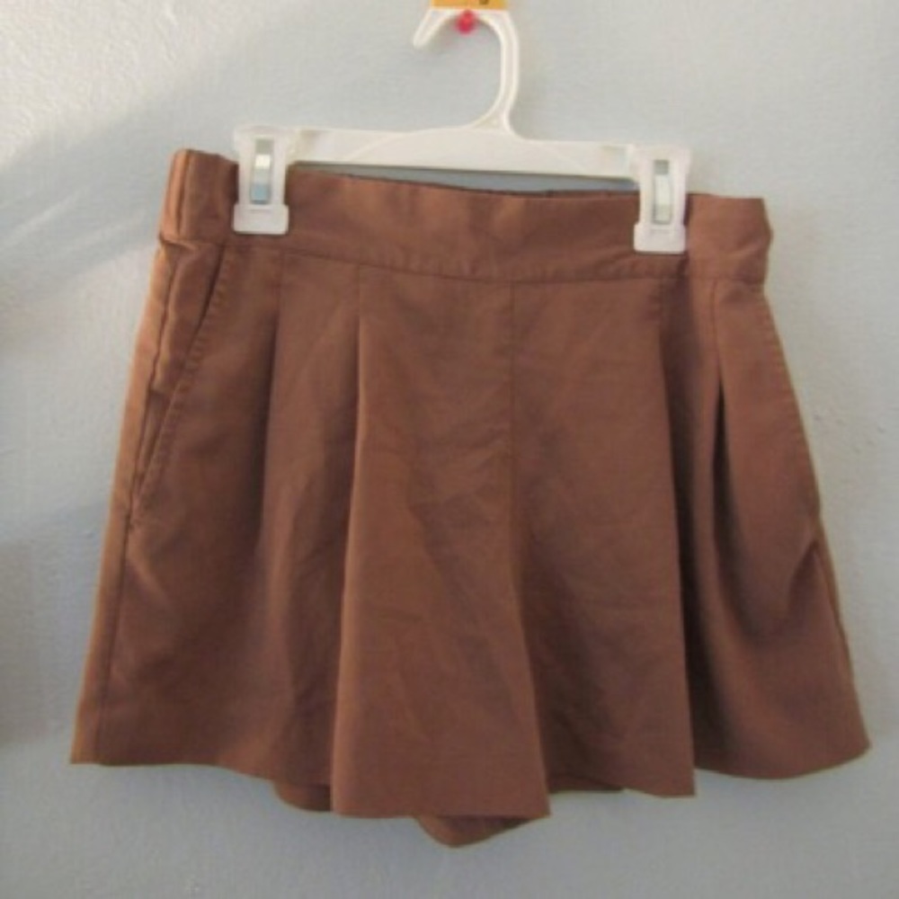 Tan/peachy colored shorts