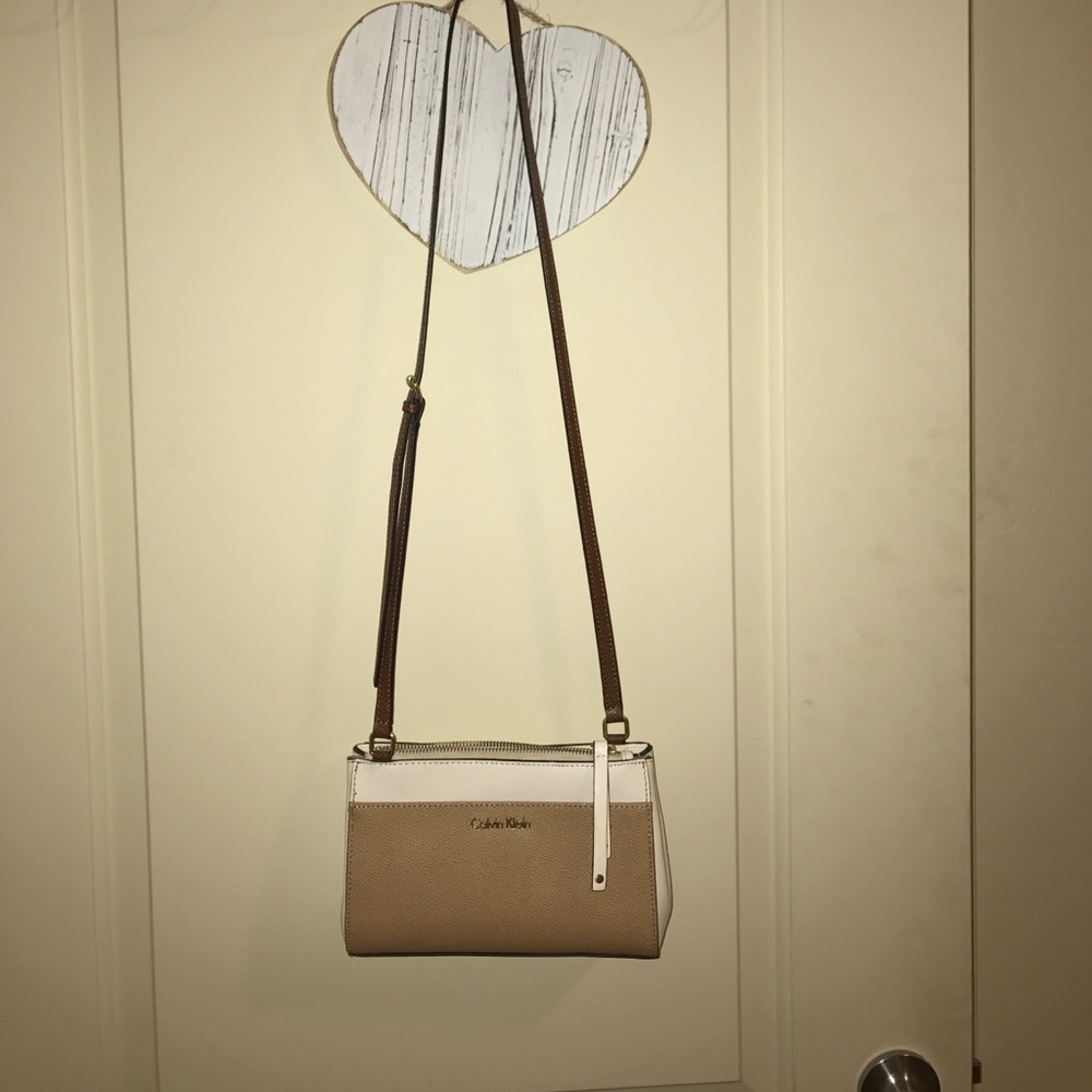 Calvin Klein tan and white purse
