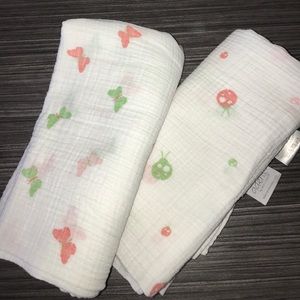 2 Aden swaddle blankets