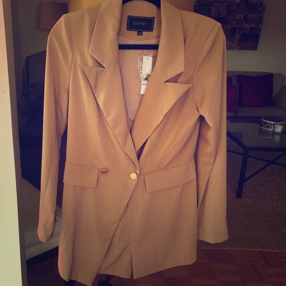 Super stylish trench coat romper! Classy yet sexy!