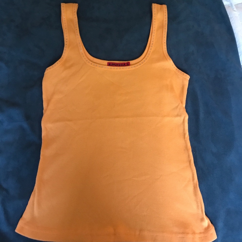 Tank top with sequins bordering straps &neck