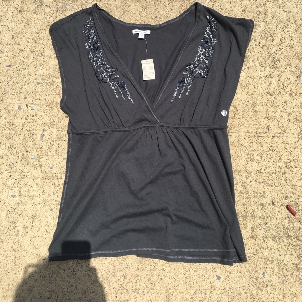 Embroidered v neck shirt