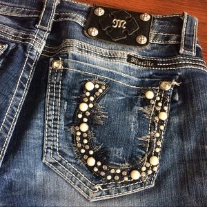 Mid-rise boot cut miss me's