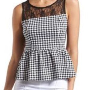 Trendy peplum houndstooth top with back