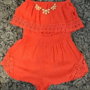 Orange lace bottom romper