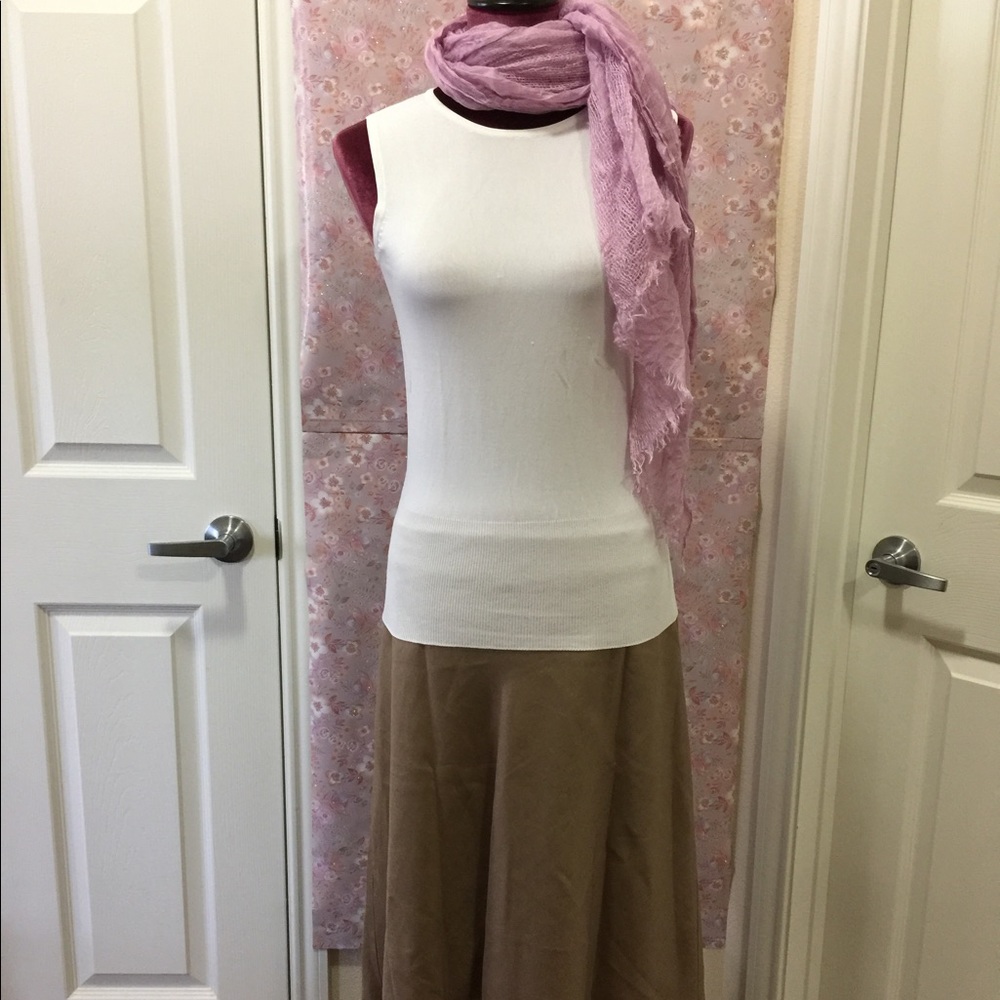 Pierre New York, white sleeveless shirt