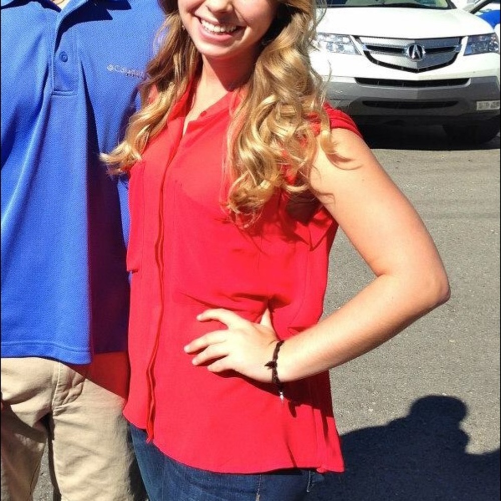Red Sleeveless Blouse