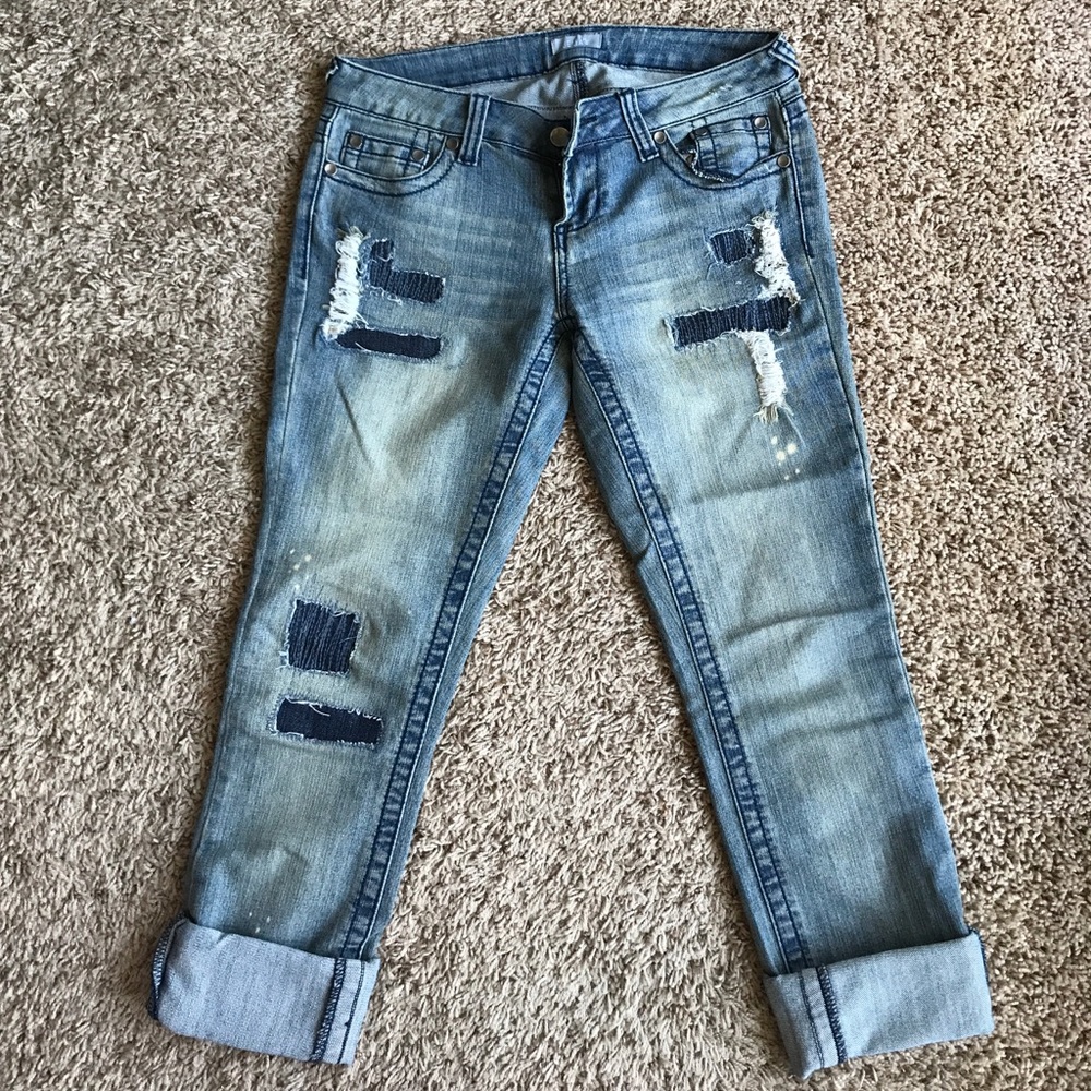 Distressed denim jeans
