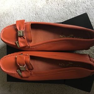 Orange LV flat slip on never been worn