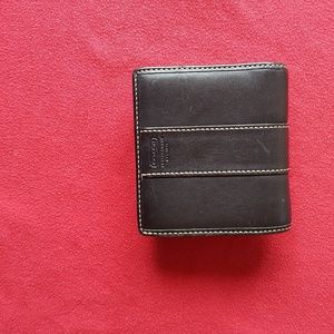 Black Coach bifold wallet .