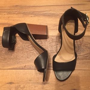 Black block heel sandals with ankle strap