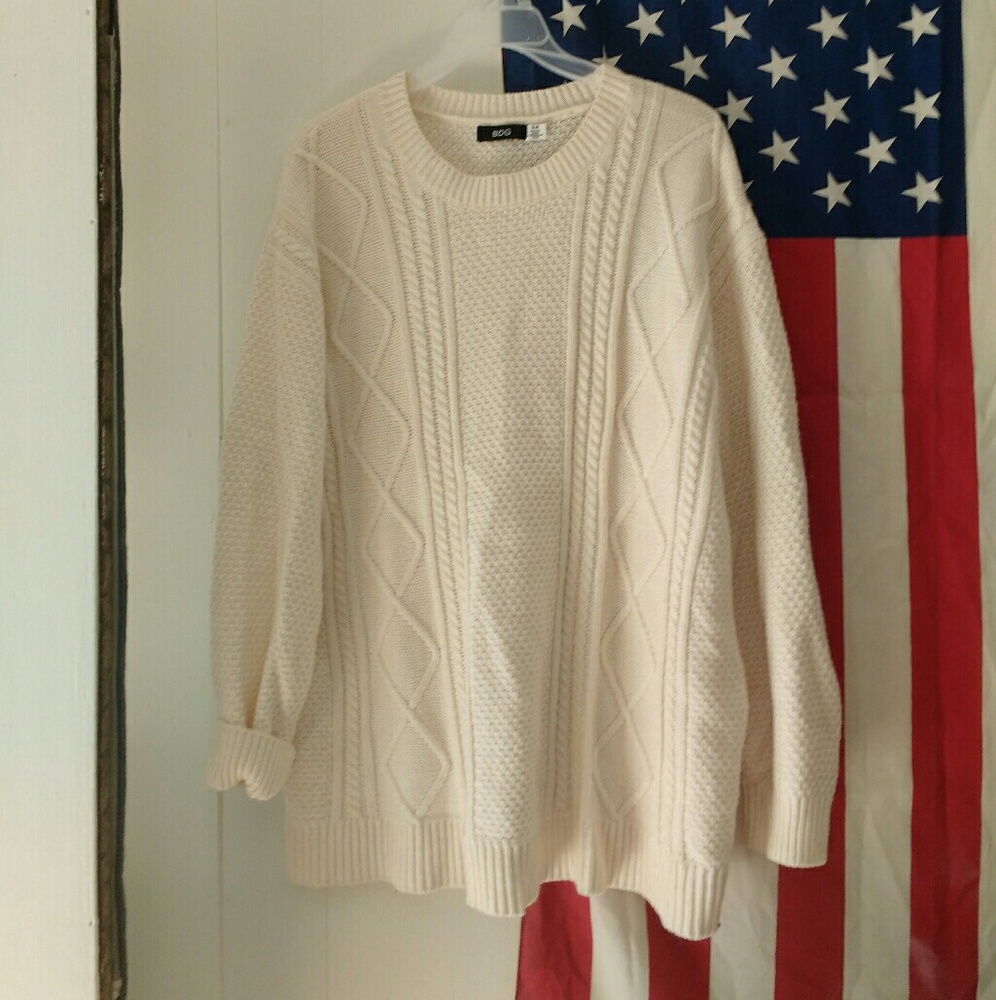 Cream sweater with elbow patches