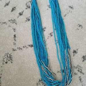 Long turquoise and silver  multi strand necklace