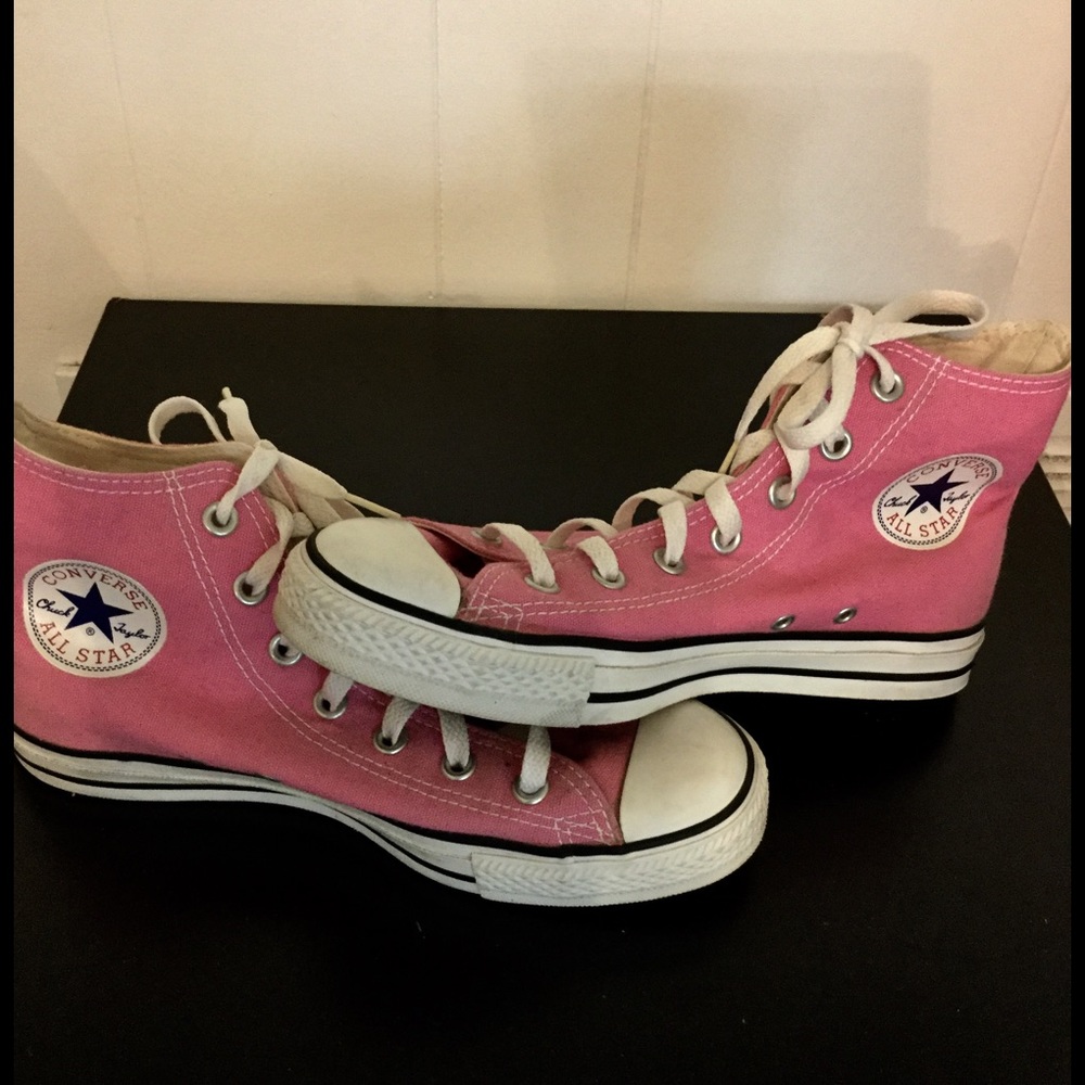 Converse Chuck Taylors pink high tops