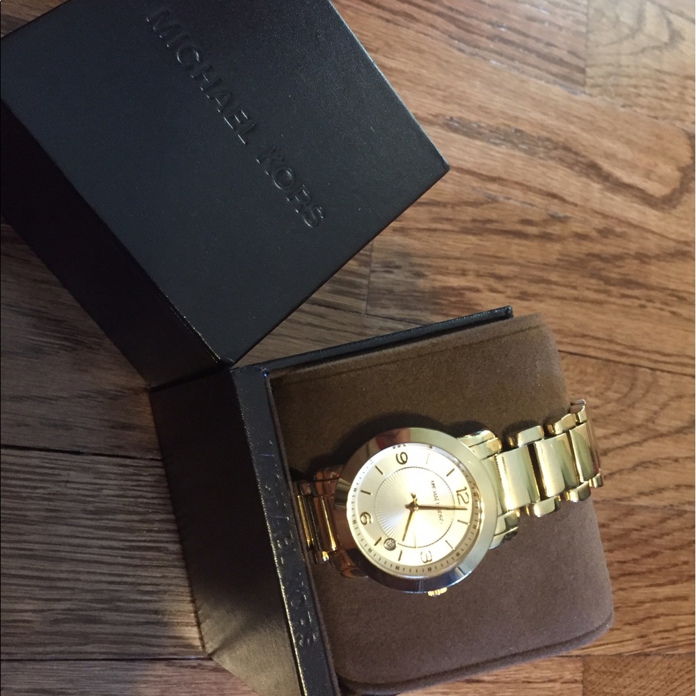 Gold MK watch