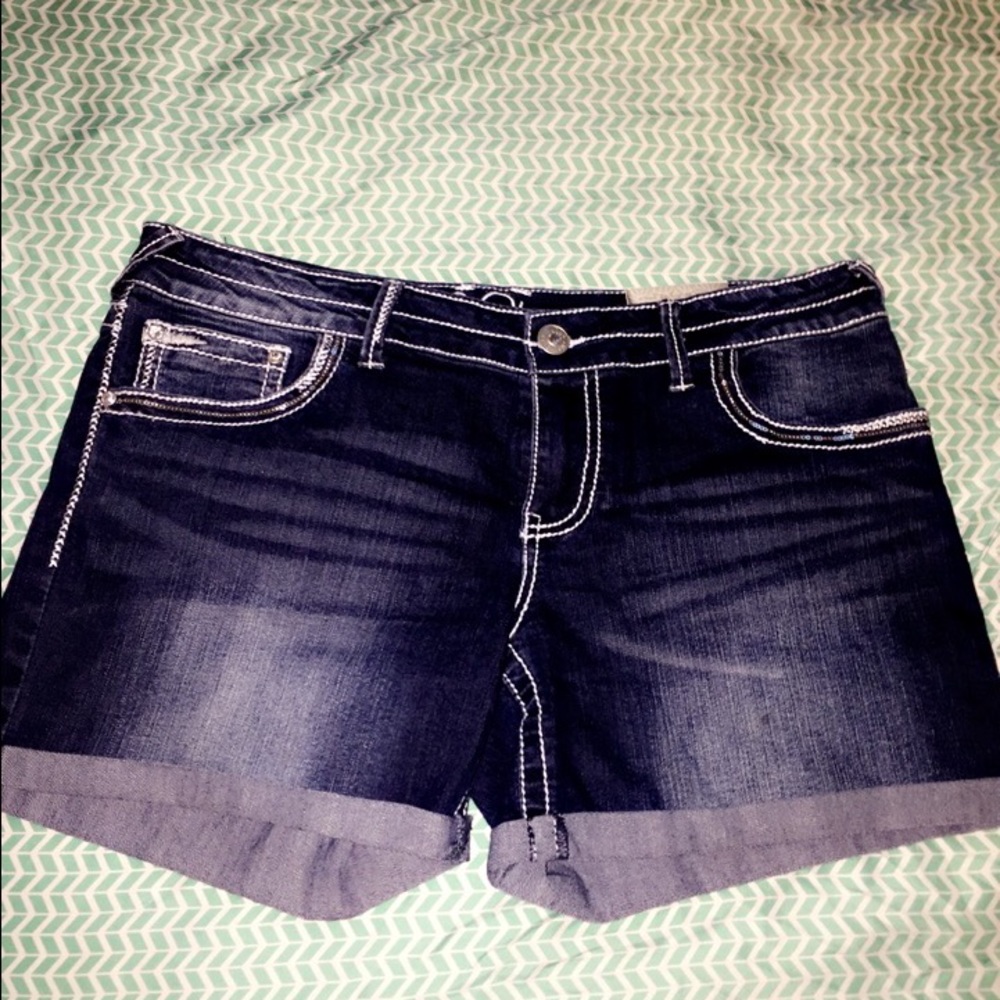 Blue jeans with diamonds on back pocket