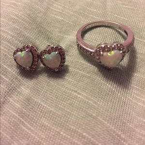 Opal heart shaped ring and earring set.