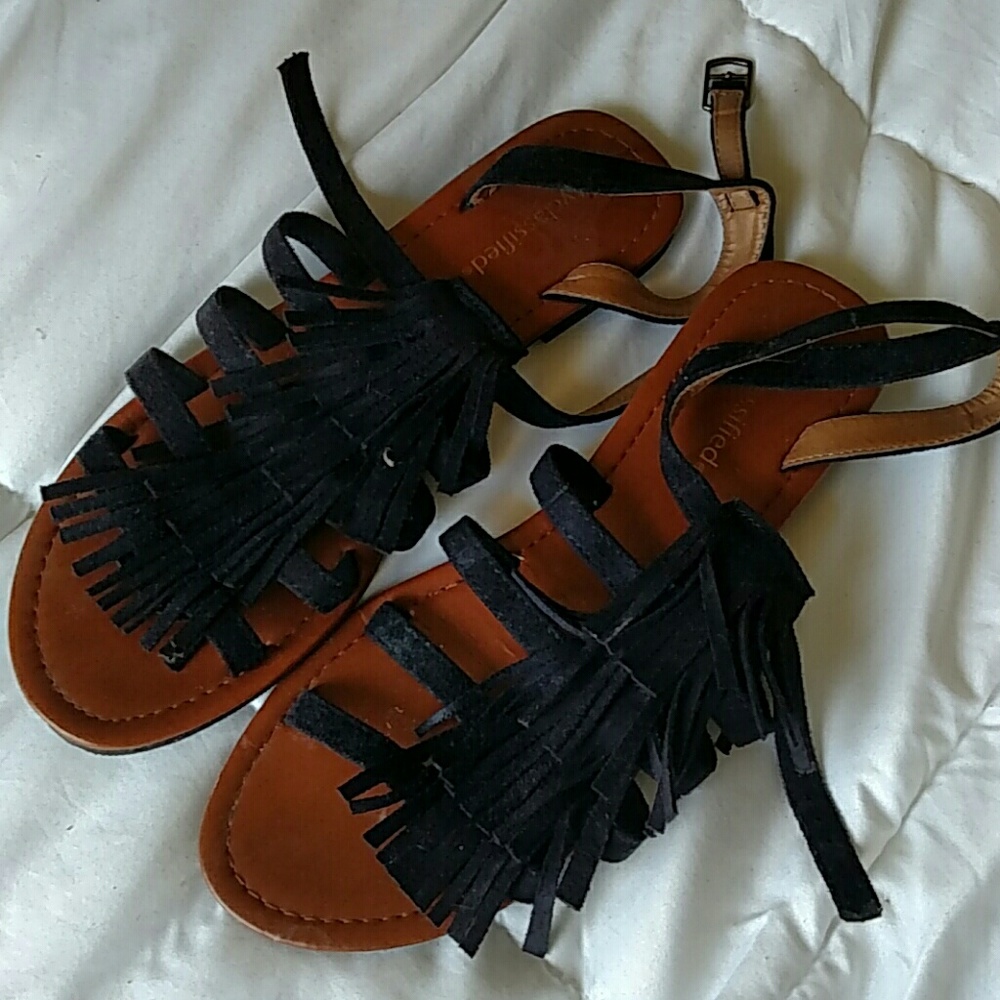 Black fringe sandals