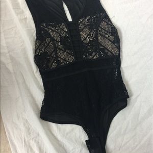 NWT lace body suit