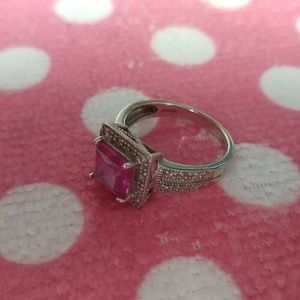 Kay Jeweler's white gold and pink sapphire ring.