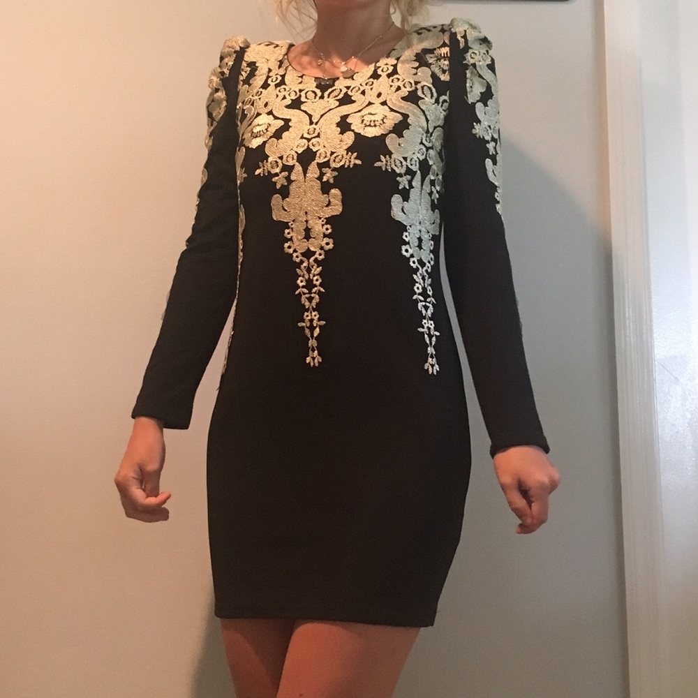 gorgeous black and gold form fitting dress !!