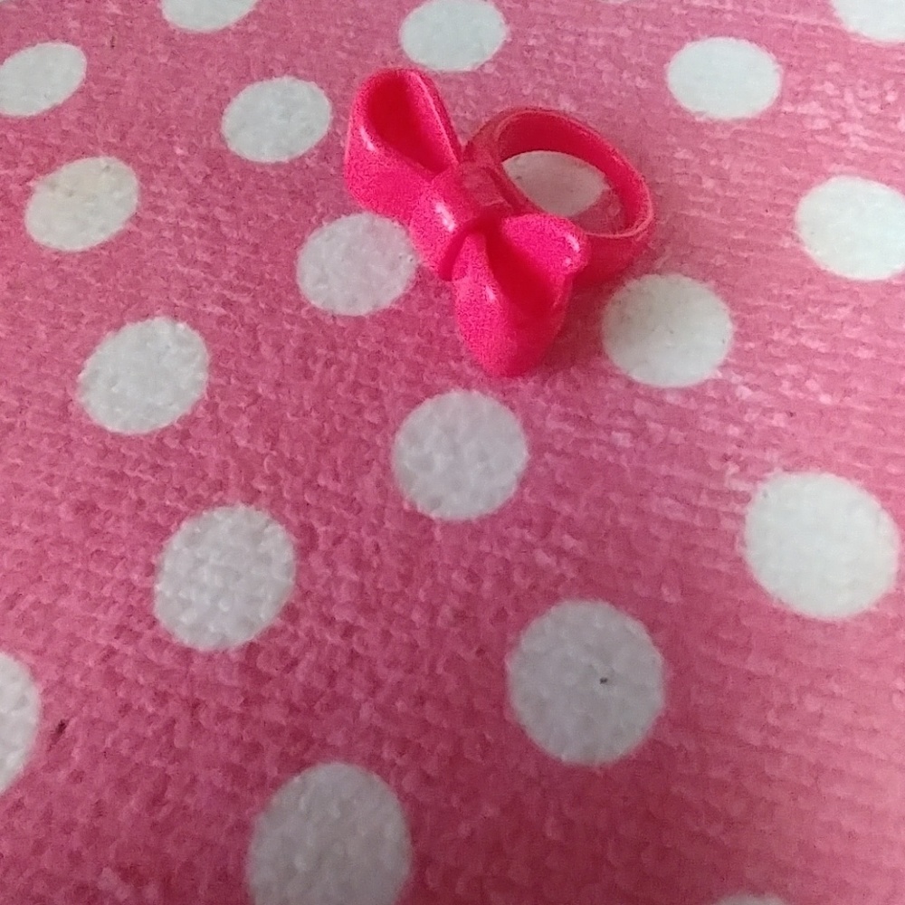 Super cute pink heavy plastic bow ring**sold**