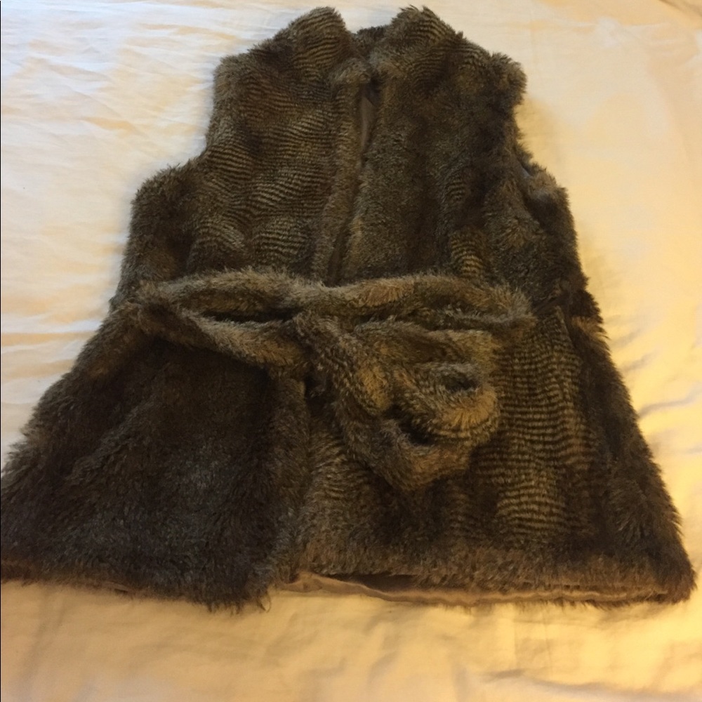 Faux fur vest! Wanna stay warm and look fabulous?