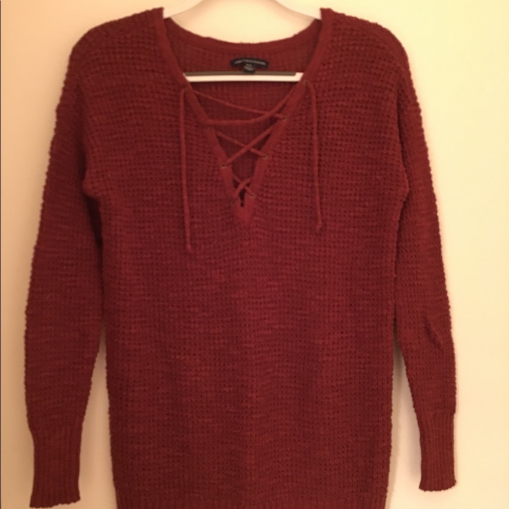 Light sweater with lace up neck