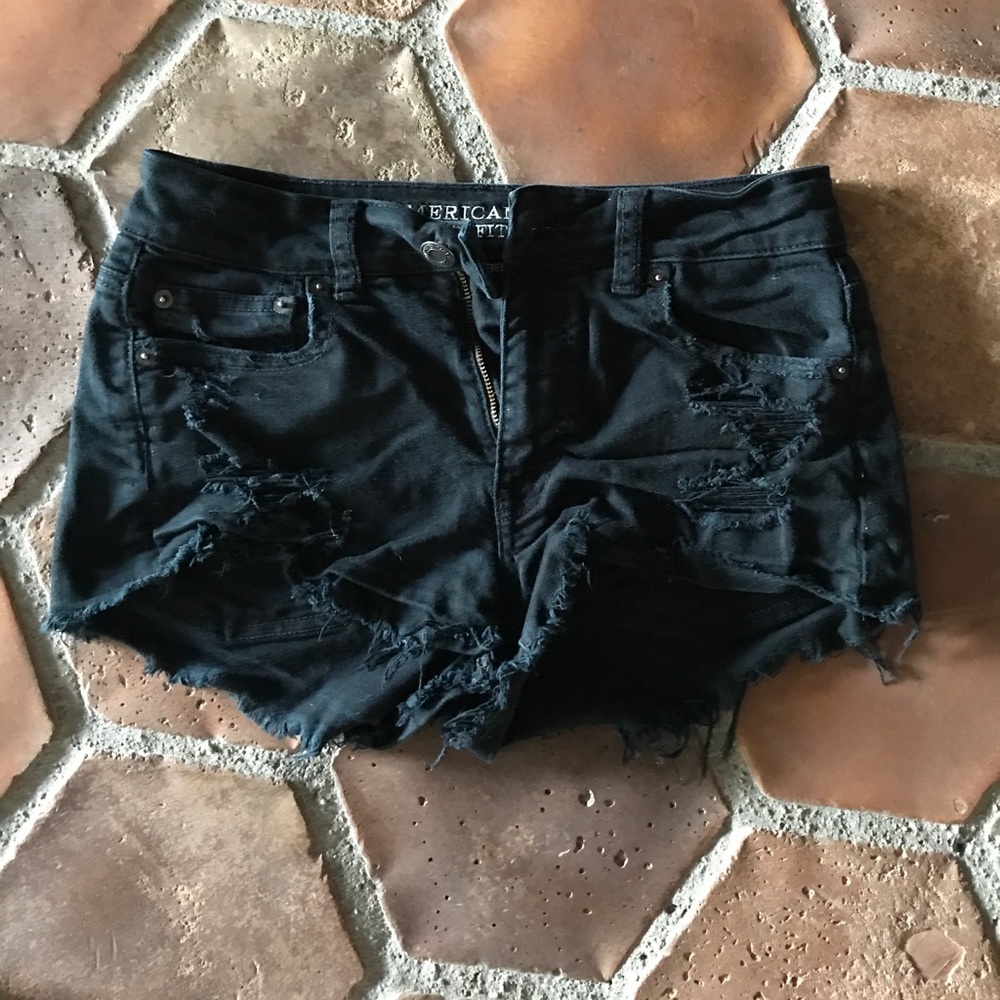 Black distressed shorts