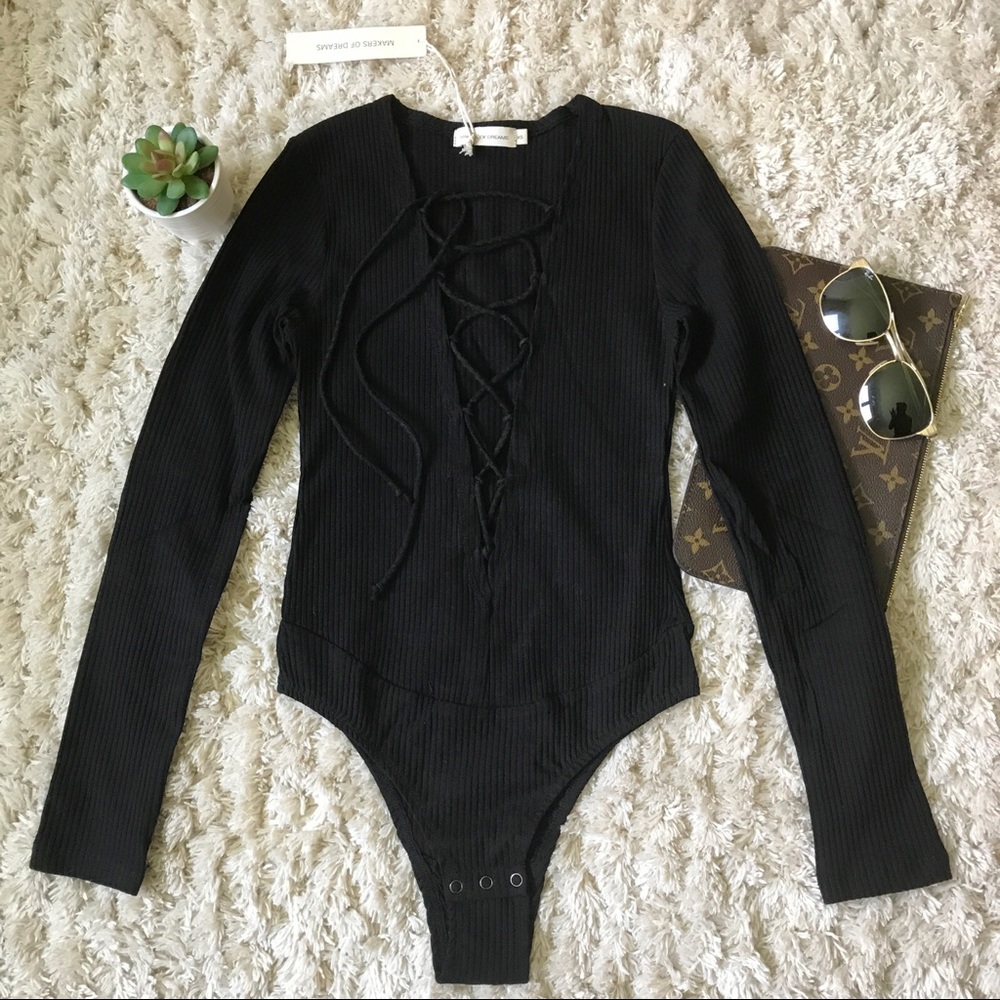 Women's lace up ribbed knit bodysuit.