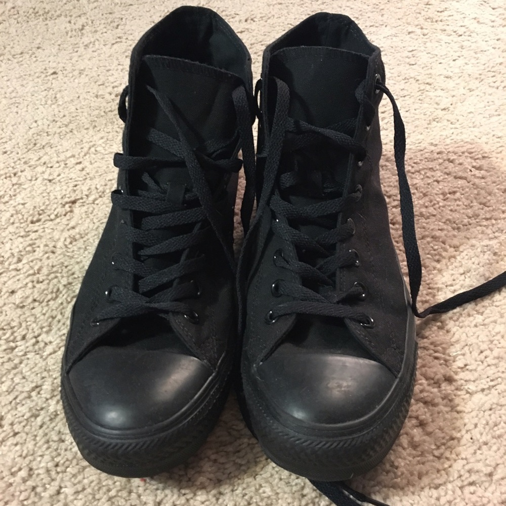 Men's black high top chucks