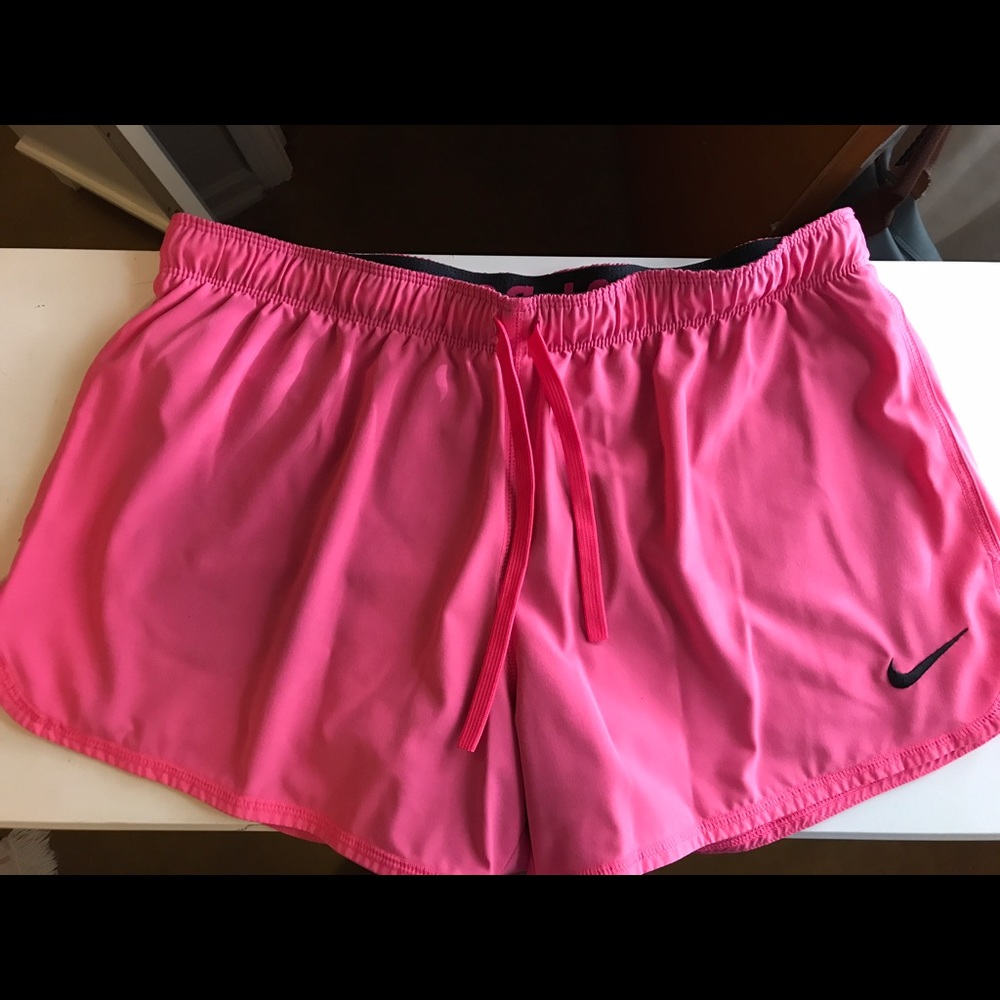 Hot pink Nike running shorts