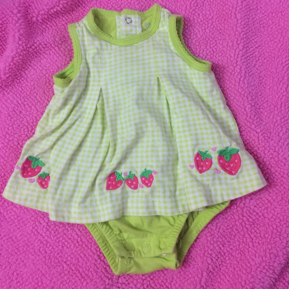Sleeveless dress with attached bodysuit