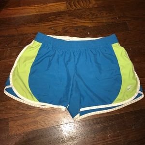 Blue and green Nike shorts