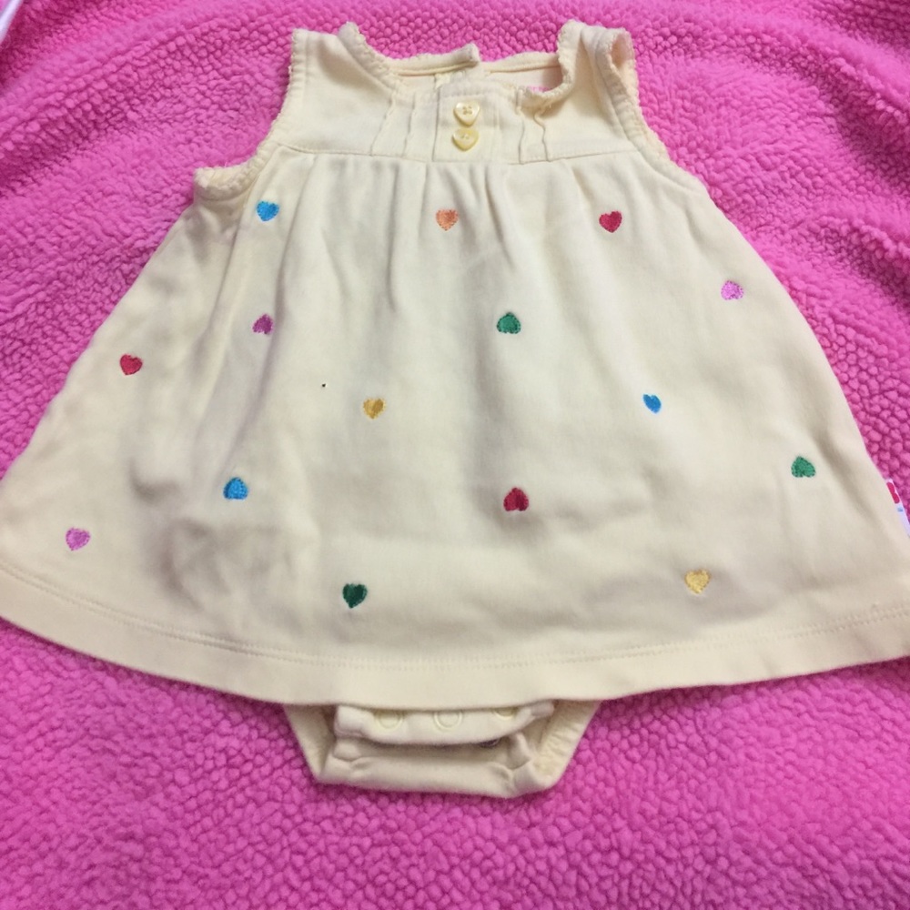 Yellow sleeveless dress with attached bodysuit