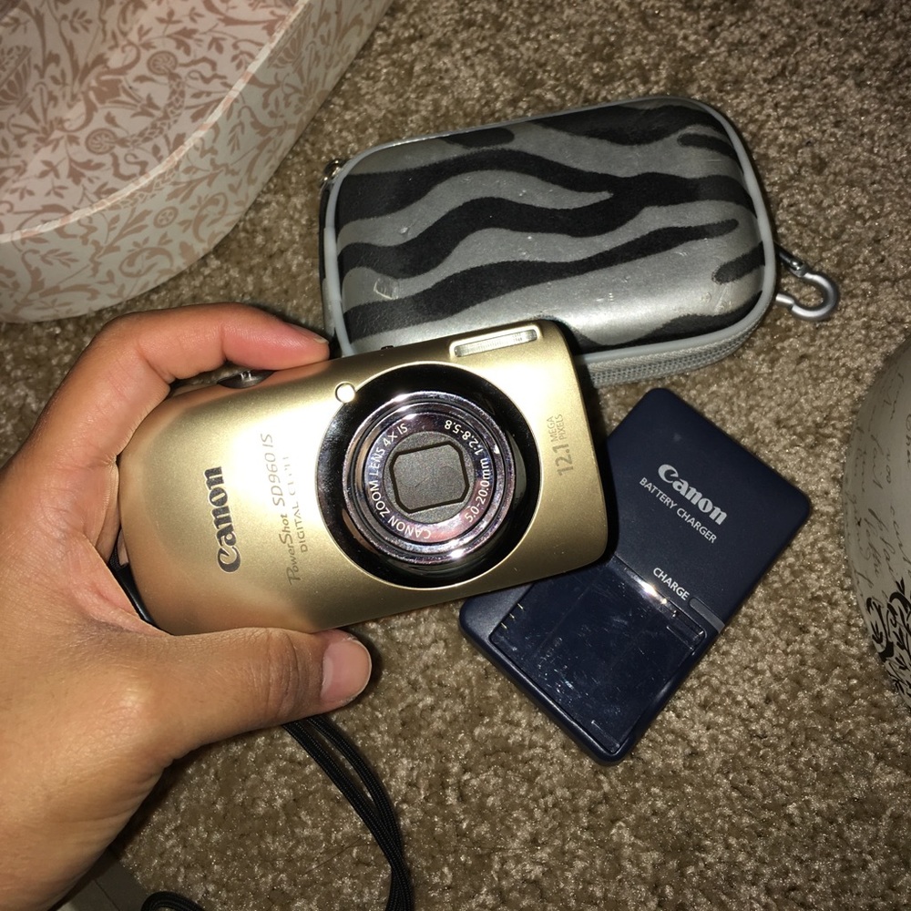 Gold Canon Powershot digital camera