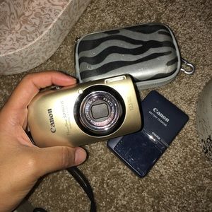 Gold Canon Powershot digital camera