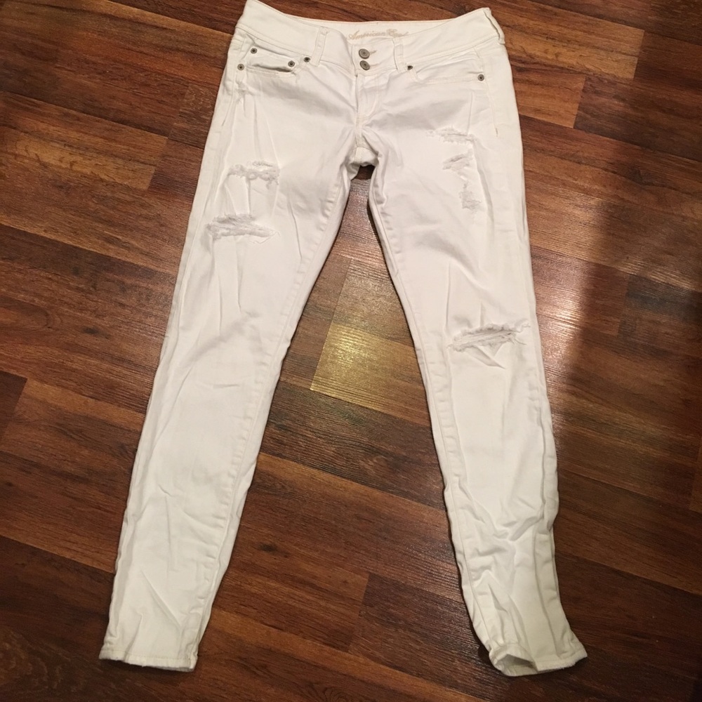 American Eagle distressed white skinny jeans