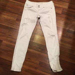 American Eagle distressed white skinny jeans