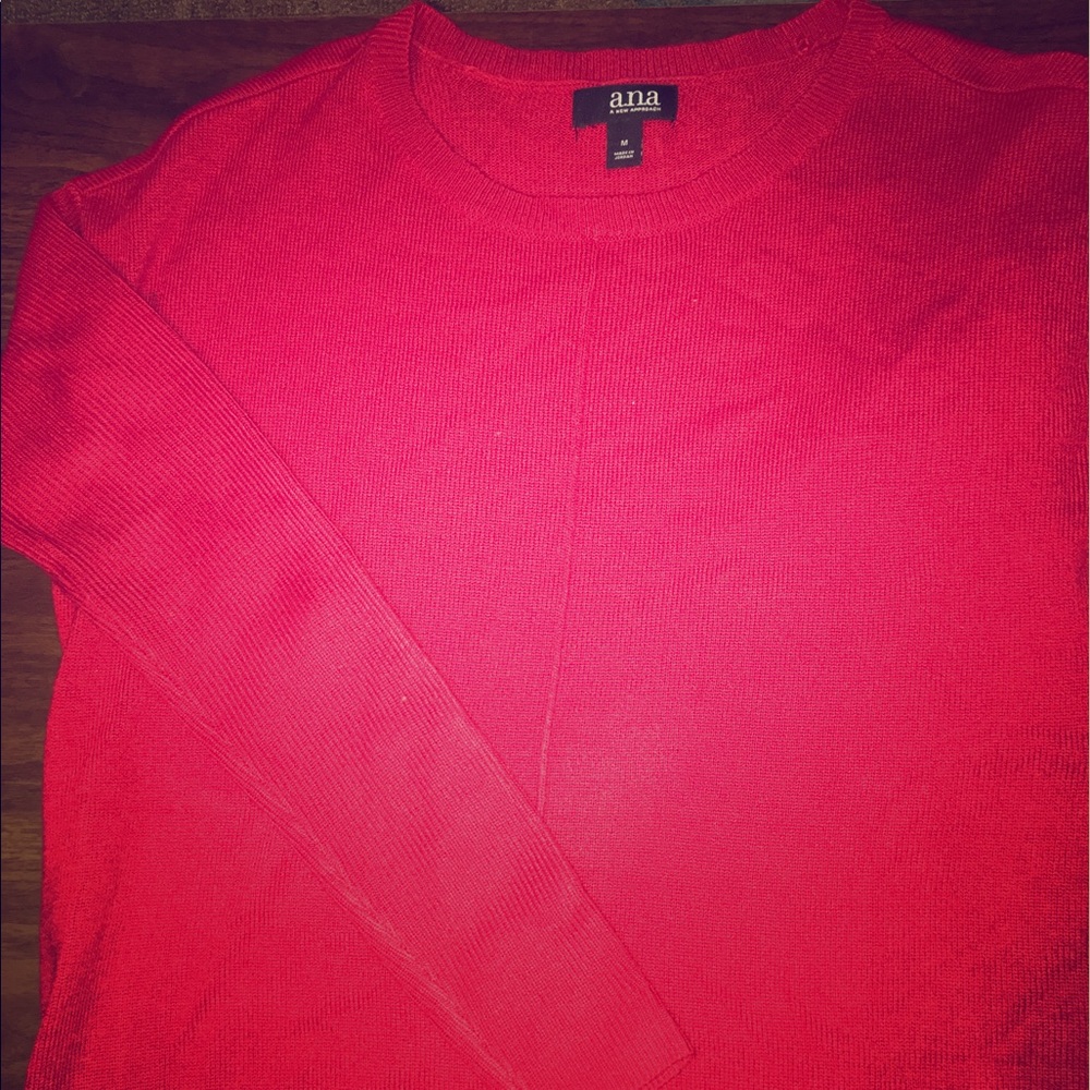 Long sleeved red shirt.