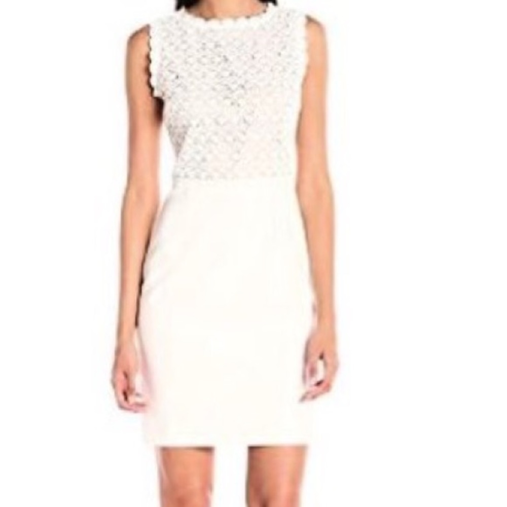 Sleeveless dress with lace on top and solid bottom