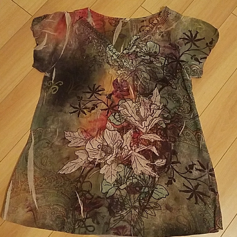 Soft silky top.  Great with jeans or leggings.