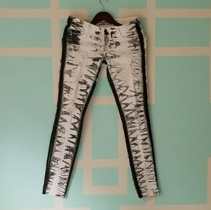 BEBE painted skinny jeans
